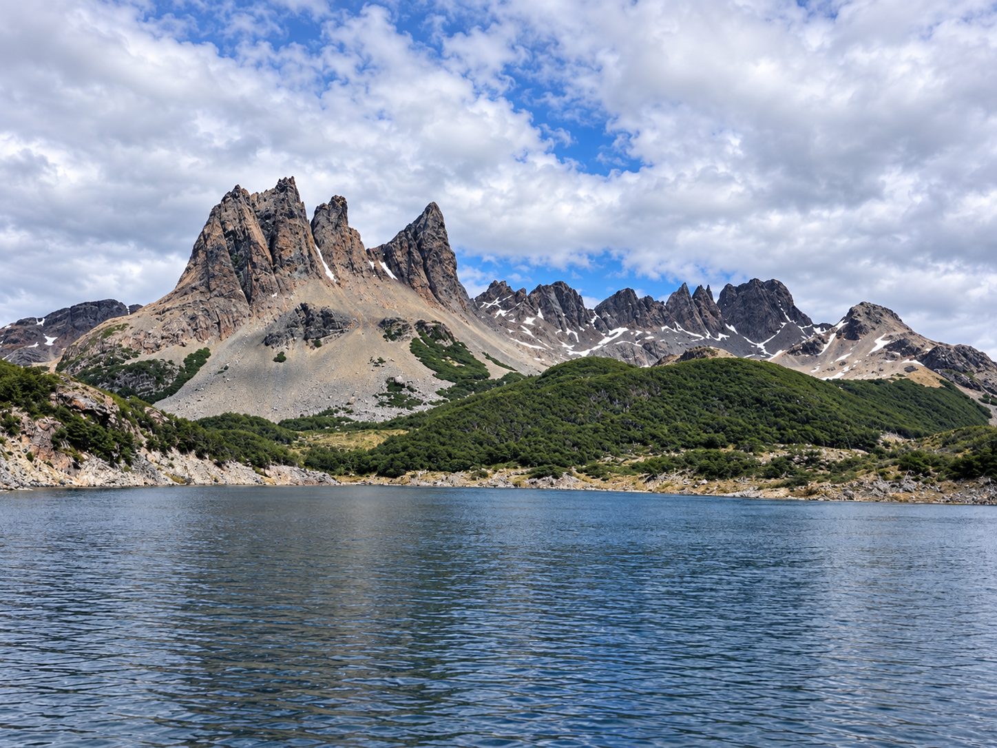 The Dientes de Navarino over a lake, on Navarino Island